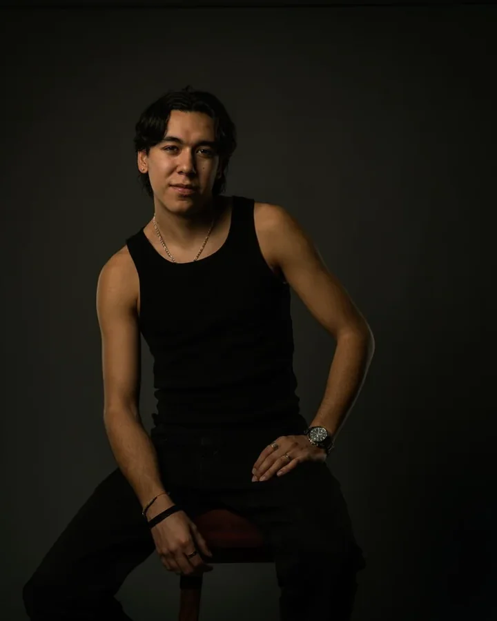 Studio portrait of Zeegwon Shilling in a black tank top